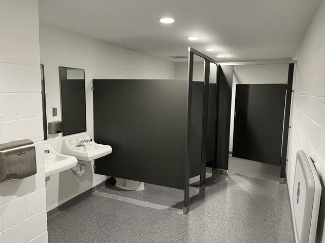 Commercial restroom renovation with clean partition layout