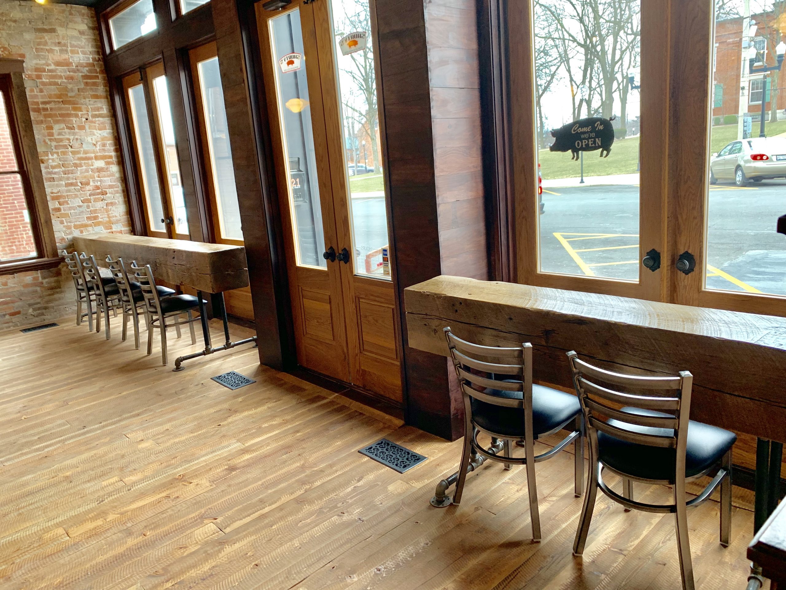 Commercial interior build-out with wood finishes and storefront windows